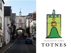 Transitions Town Totnes logga som är inspirerad av Totnes High Street. 
